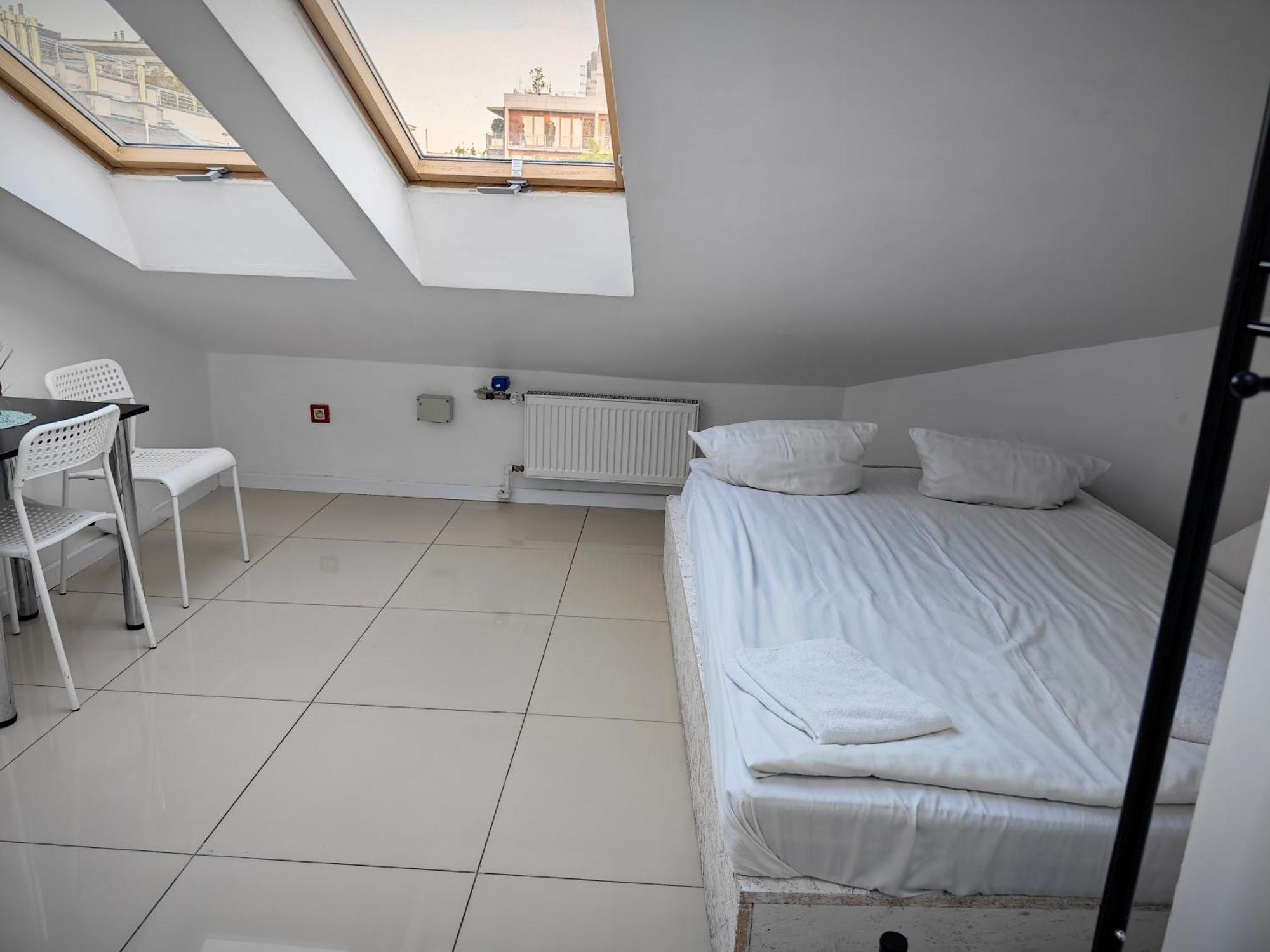 Apartamenty Hoza Attic Studio Varsovia Habitación foto