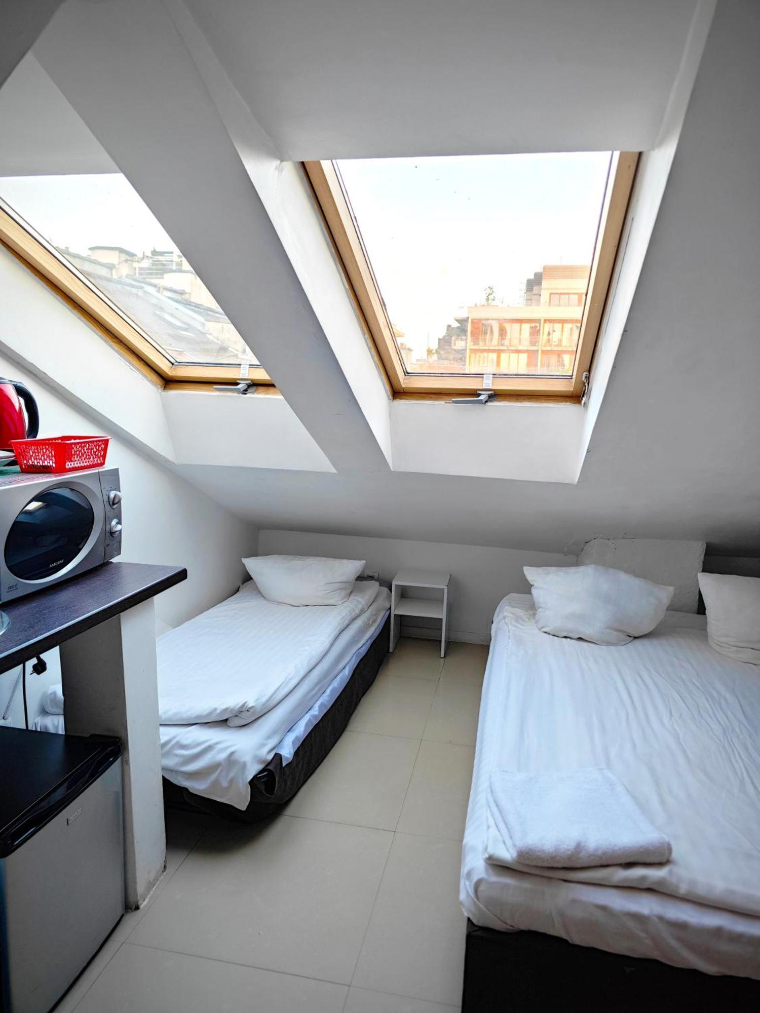 Apartamenty Hoza Attic Studio Varsovia Habitación foto