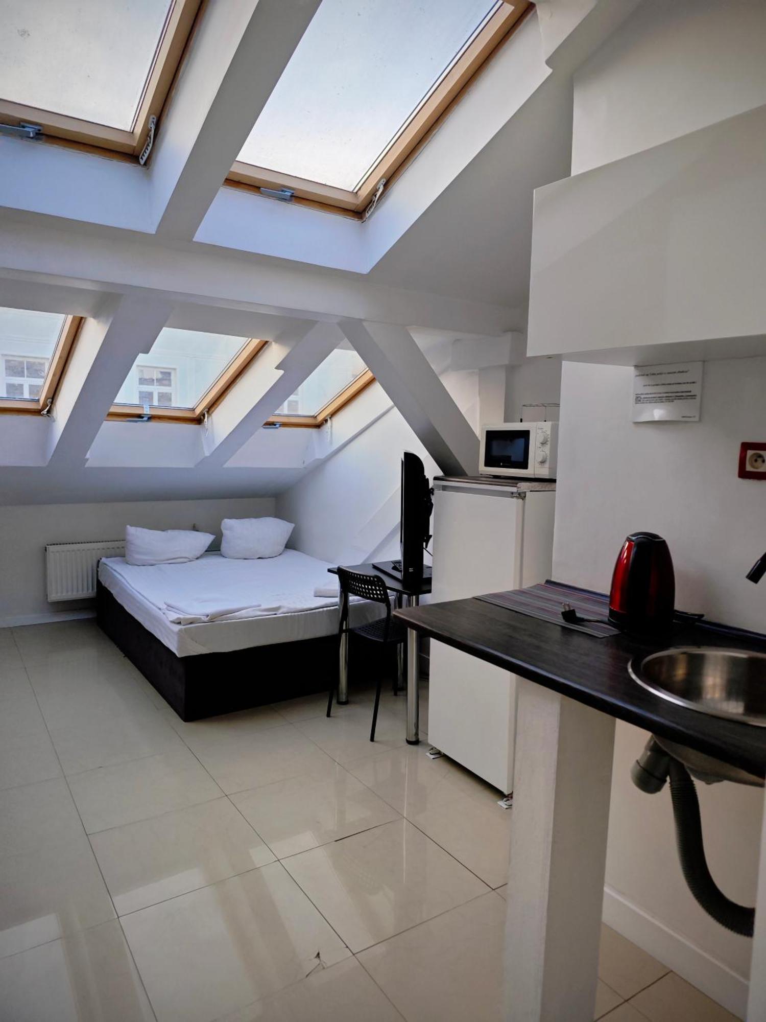 Apartamenty Hoza Attic Studio Varsovia Habitación foto