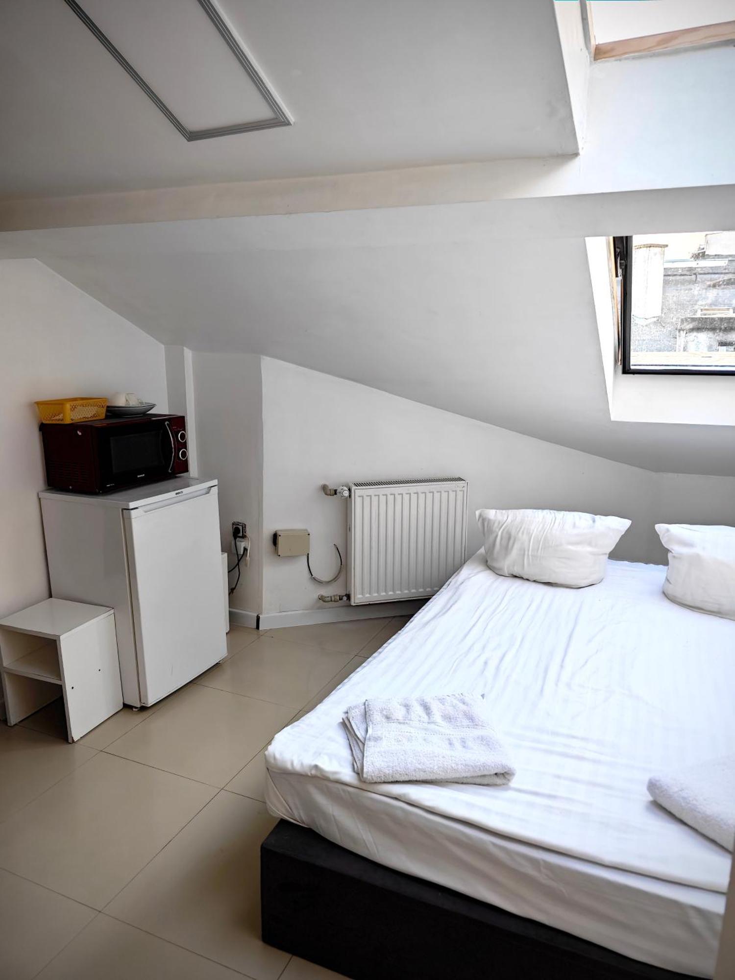 Apartamenty Hoza Attic Studio Varsovia Habitación foto